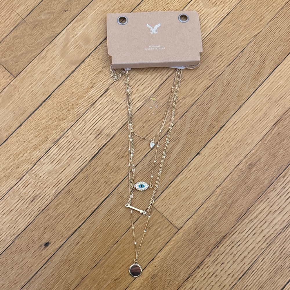 NWT American Eagle Gold-Tone Multi-Layer Necklace with Blue Accent Eye